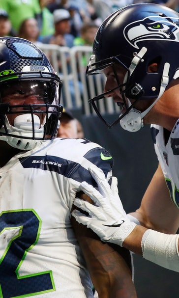 Wilson throws 2 TD passes as Seattle stops Atlanta 27-20